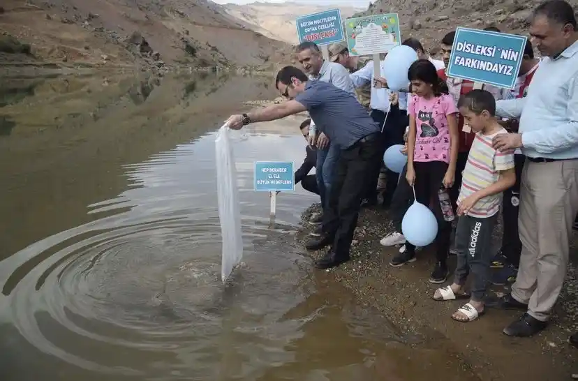 Garzan Barajı ve Çayı'na 750 bin adet balık salındı
